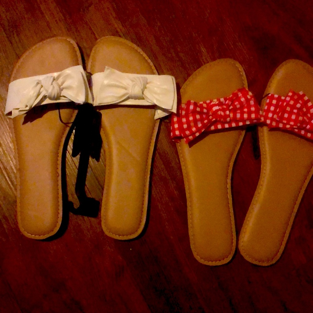 Checker and white slides with a top bow never worn